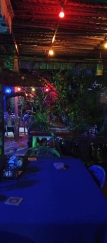 a room with a bunch of plants and lights at Beni Beach Resort Batticaloa, Sri Lanka in Kallady