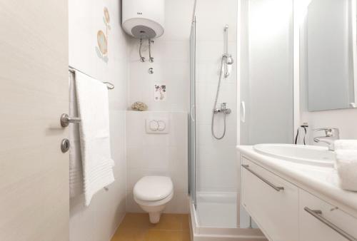 Kúpeľňa v ubytovaní Apartments Kump