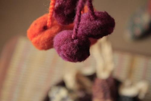 three teddy bears hanging on a string at Casa Suyay in Tilcara