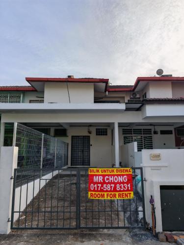 a sign on the gate of a house at MixxHome Seremban 2, One Queen Bed, Private Bathroom in Seremban