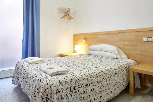 Cama o camas de una habitación en Hostal River