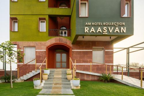 a building with stairs in front of it at Raasvan, Vrindavan- AM Hotel Kollection in Vrindāvan