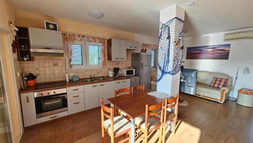 Kuchyňa alebo kuchynka v ubytovaní Žigulin Apartment