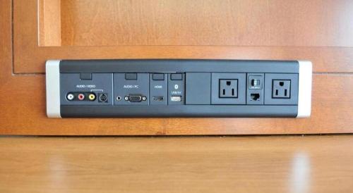 avd player in a cabinet with a control panel at THE HOTEL AT KIRKWOOD CENTER in Cedar Rapids