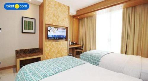 Una cama o camas en una habitación de The Rinra