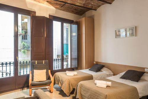 Posteľ alebo postele v izbe v ubytovaní Apartments HHB