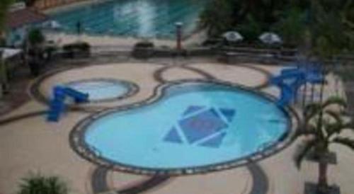Бассейн в Bumi Wiyata Hotel или поблизости