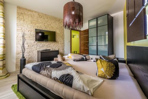 Postel nebo postele na pokoji v ubytování Apartment Vanessa - Tatranská Lomnica