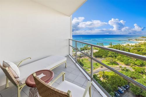 a balcony with a view of the ocean at Ka Laʻi Waikiki Beach, LXR Hotels & Resorts in Honolulu