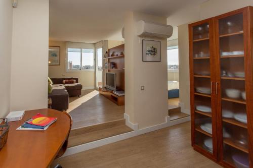 A bed or beds in a room at Gaudi Views Apartment