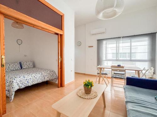 Posteľ alebo postele v izbe v ubytovaní Plz de la Merced Apartamentos Solera