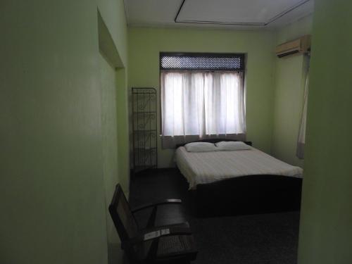 Postel nebo postele na pokoji v ubytování Serenity