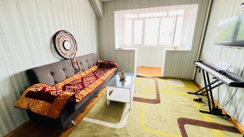 Μια τηλεόραση ή/και κέντρο ψυχαγωγίας στο Nur Kyrgyz Guest House