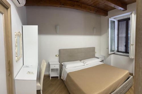 Ένα ή περισσότερα κρεβάτια σε δωμάτιο στο Fata34 Luxury B&B
