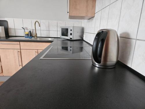 a kitchen with a toaster sitting on a counter at Eigene Wohnung und zentrale Lage in Herne
