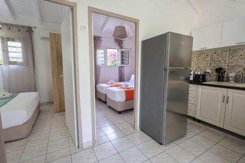 Kuchyň nebo kuchyňský kout v ubytování Coté plage Le Balaou Saint Francois
