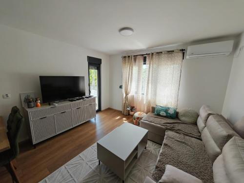 TV a/nebo společenská místnost v ubytování Grabak B3