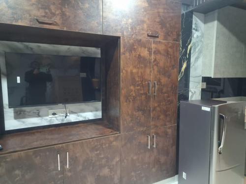 Kuchyň nebo kuchyňský kout v ubytování Sobha homestay