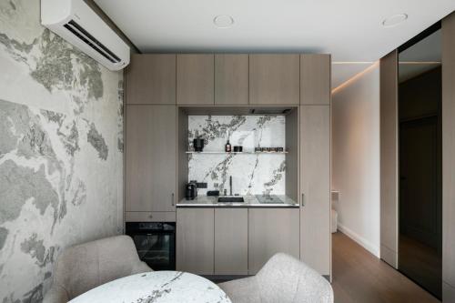 Katil atau katil-katil dalam bilik di Sky&River Towe Apartments Kaunas City Center
