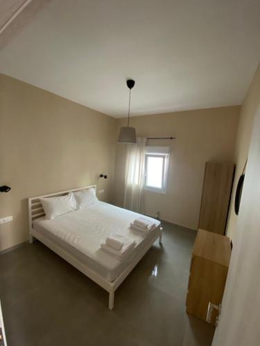 Postel nebo postele na pokoji v ubytování Spitaki Luxury Home