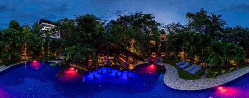 Bazén v ubytování Sundaras Sigiriya Jungles Caves Resort nebo v jeho okolí
