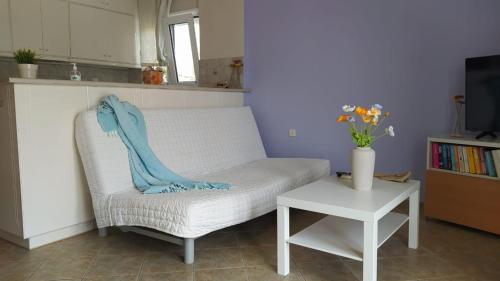 Χώρος καθιστικού στο Plakes Suites