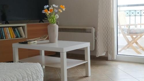 Χώρος καθιστικού στο Plakes Suites