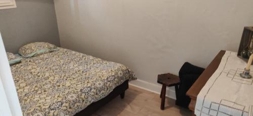 Ένα ή περισσότερα κρεβάτια σε δωμάτιο στο Appartement T2 avec terrasse Luchon