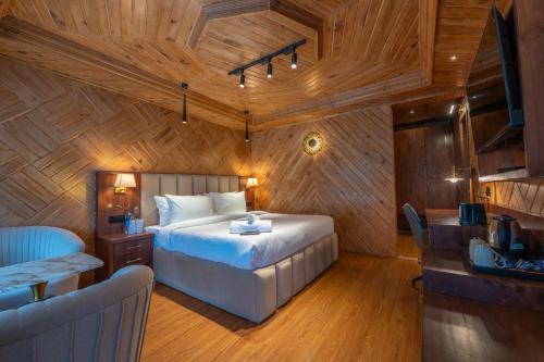 Ein Bett oder Betten in einem Zimmer der Unterkunft Ekaanth