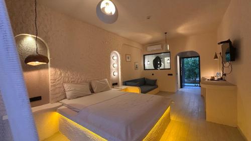 Ένα ή περισσότερα κρεβάτια σε δωμάτιο στο Z Exclusive Hotel and Villas