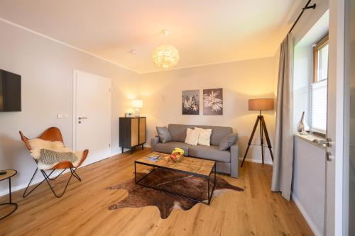 TV/trung tâm giải trí tại Das Bergquartier - Ferienwohnung Zugspitze