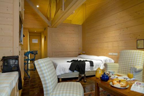 Posezení v ubytování Relais du Bois Saint Georges - Hôtel de Charme