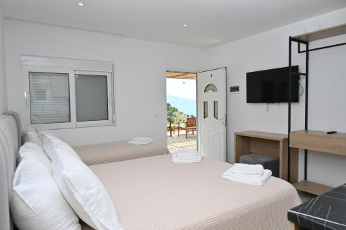 Postel nebo postele na pokoji v ubytování Summer Dream Cottage