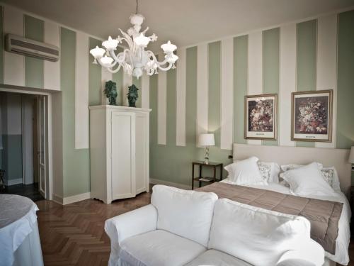 Postel nebo postele na pokoji v ubytování Residenza Borgo 27