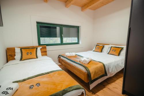 Postel nebo postele na pokoji v ubytování Villa Dos Padrinos