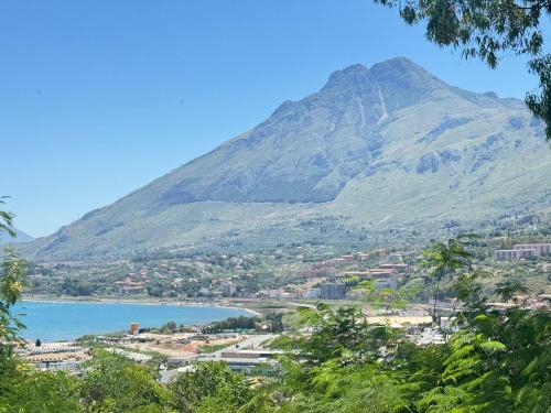 a mountain with a view of a town and a lake at Casa Ponticello in Termini Imerese