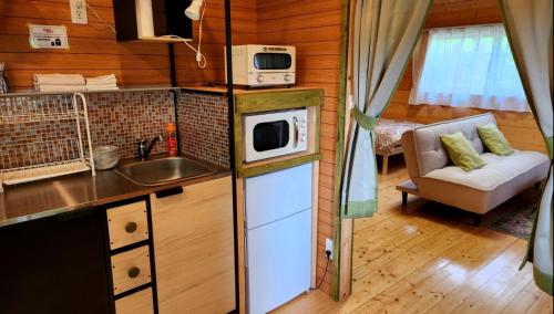 Kuchyň nebo kuchyňský kout v ubytování 藤のヴィラ オリーブ棟 Self check-in