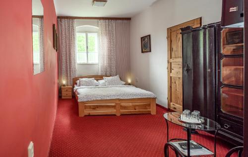 Postel nebo postele na pokoji v ubytování Penzion u Hradilů