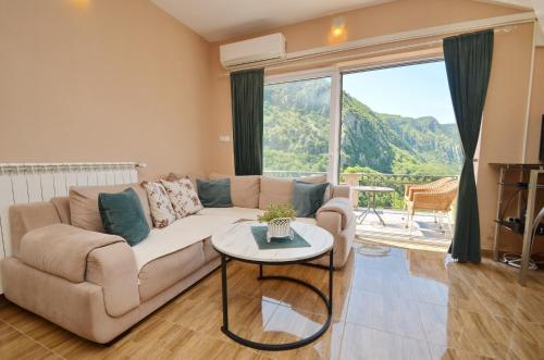 Χώρος καθιστικού στο Apartmani Vasilije