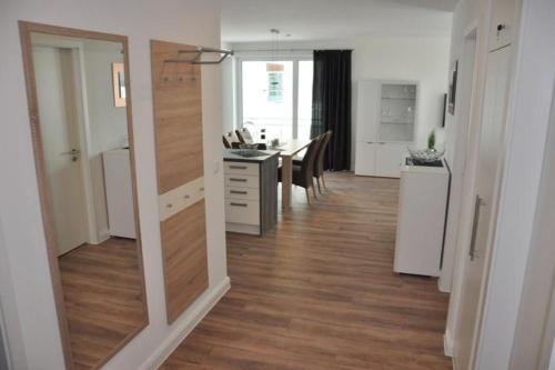 Dapur atau dapur kecil di StrandGut inkl Saisonstrandkorb und Wäsche Set