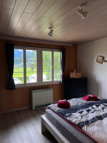 Ein Bett oder Betten in einem Zimmer der Unterkunft Camping Lazy Rancho - Eiger - Mönch - Jungfrau - Interlaken