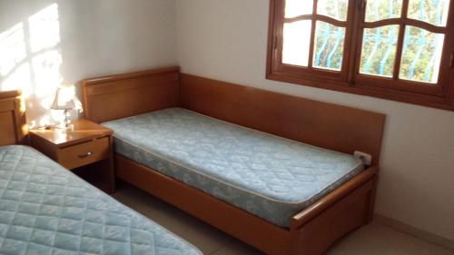Postel nebo postele na pokoji v ubytování Maison Villa Sousse Chott-Meriem, jardin arboré, 400 m de la plage