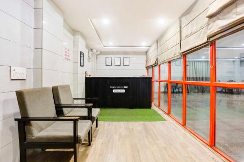 Posezení v ubytování Townhouse Oak Iskcon Temple Rohini