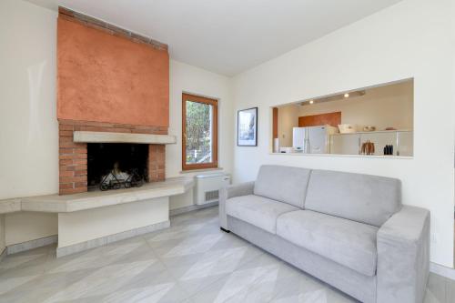 Ruang duduk di Maison Sabina con splendida vista lago ed idromassaggio