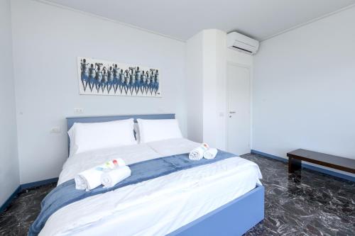 Katil atau katil-katil dalam bilik di Maison Sabina con splendida vista lago ed idromassaggio