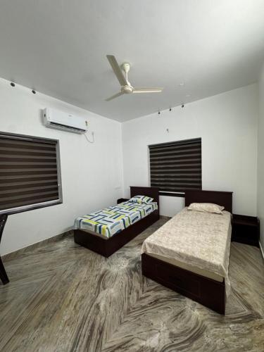 Niharika Homestayにあるベッド
