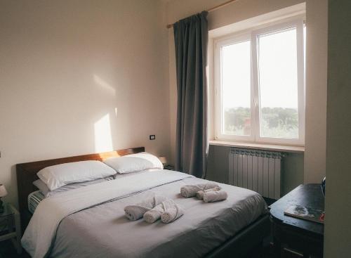 Postel nebo postele na pokoji v ubytování Casa YUVI
