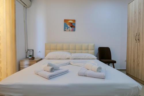 Llit o llits en una habitació de Cactus Apartment