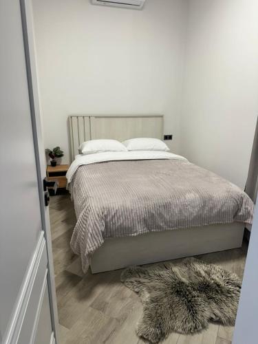 Postel nebo postele na pokoji v ubytování Grey House