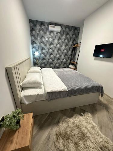 Postel nebo postele na pokoji v ubytování Grey House